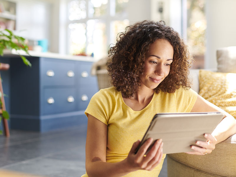 woman using tablet device