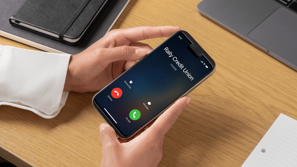Mobile Phone with Rally Credit Union showing on caller id